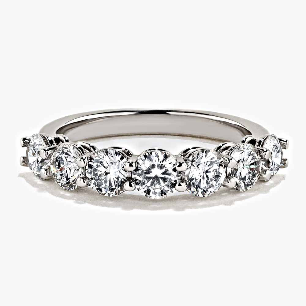 Shown in 18K White Gold|lab grown diamond accented band with round cut diamonds set in 18k white gold recycled metal