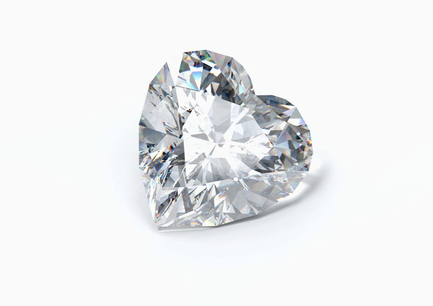 A heart shaped diamond (a Lab-Grown Diamond) on a white background, by MiaDonna