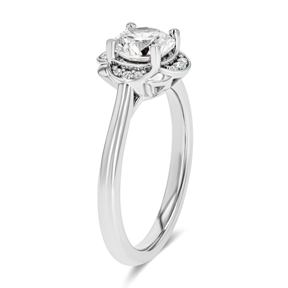 Shown here with a 1.0ct Round Cut Lab Grown Diamond center stone in 14K White Gold|nature inspired diamond halo engagement ring with round cut lab grown diamond center stone set in 14k white gold recycled metal